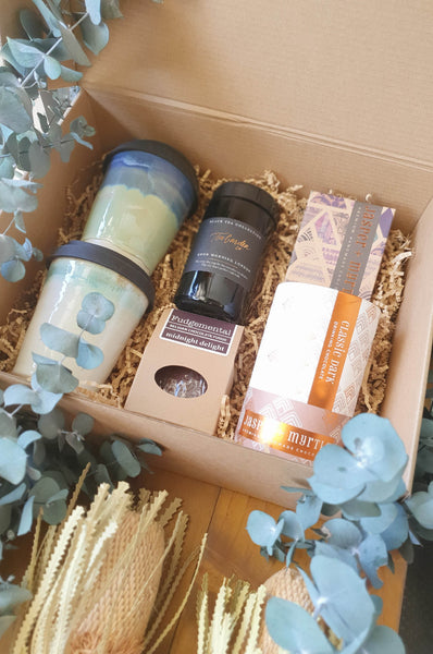 This hamper includes two Canberra handmade ceramic mugs, a Canberra made fudge, a Canberra made tea blend, a Canberra made hot chocolate and a block of Canberra made award winning chocolate.